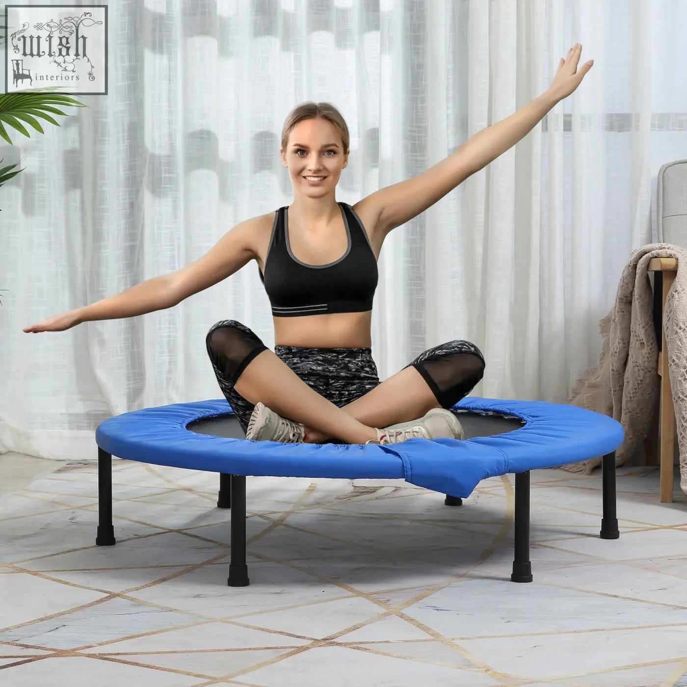 Blue mini fitness trampoline with solid metal frame and black legs for indoor outdoor exercise and yoga