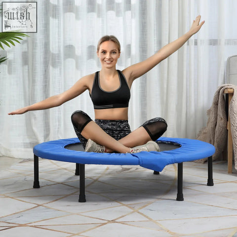 Blue mini fitness trampoline with solid metal frame and black legs for indoor outdoor exercise and yoga