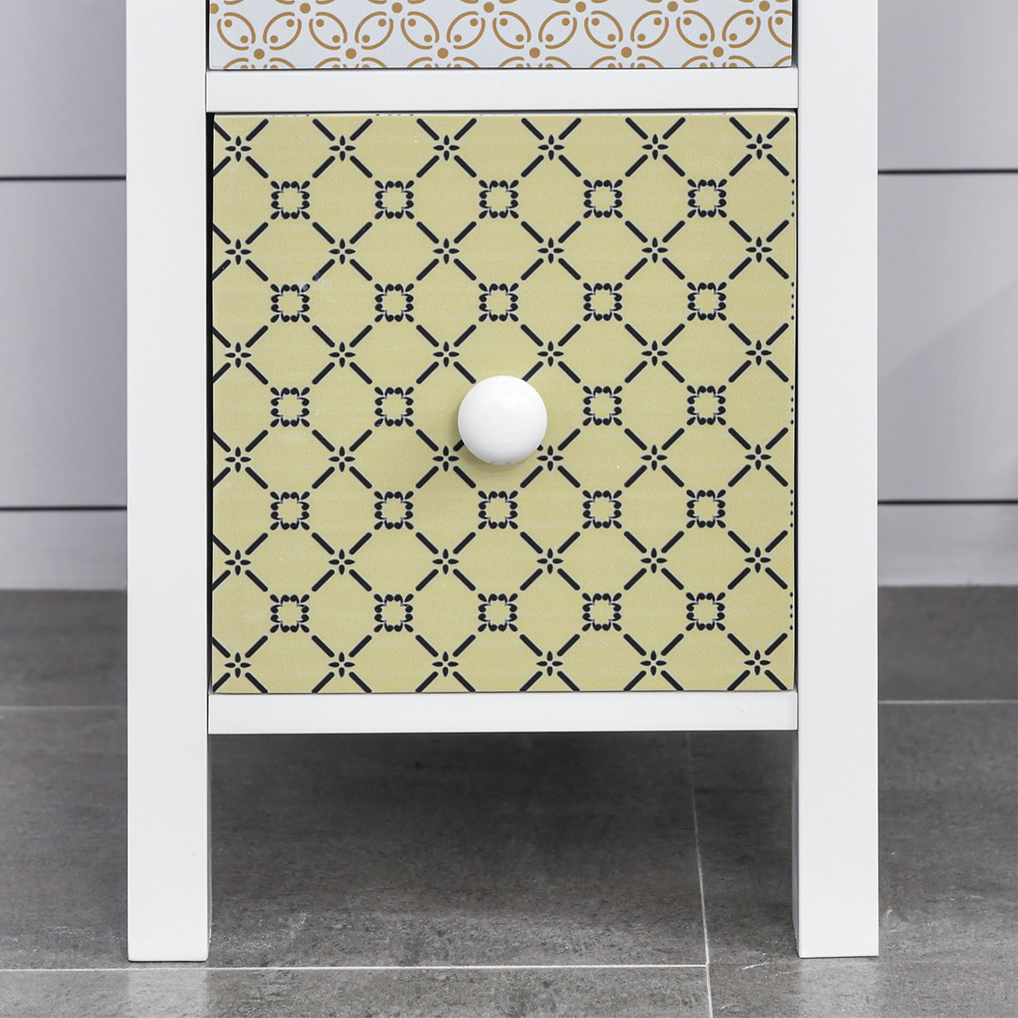Homcom white framed chest of drawers with pale yellow drawer and black pattern featuring anti tipping straps for safety