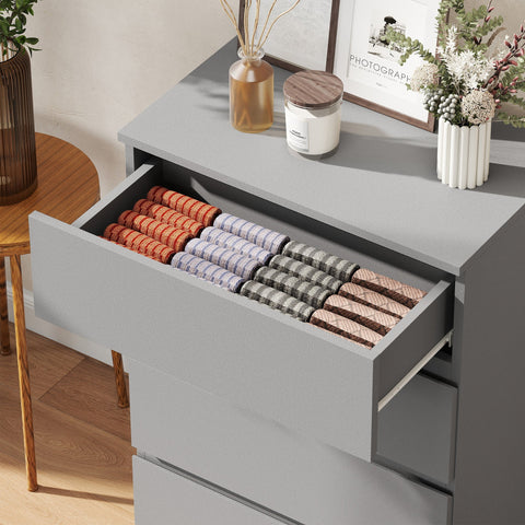 Gray drawer organizer filled with neatly stacked socks inside homcom chest with four drawers and handle-less design