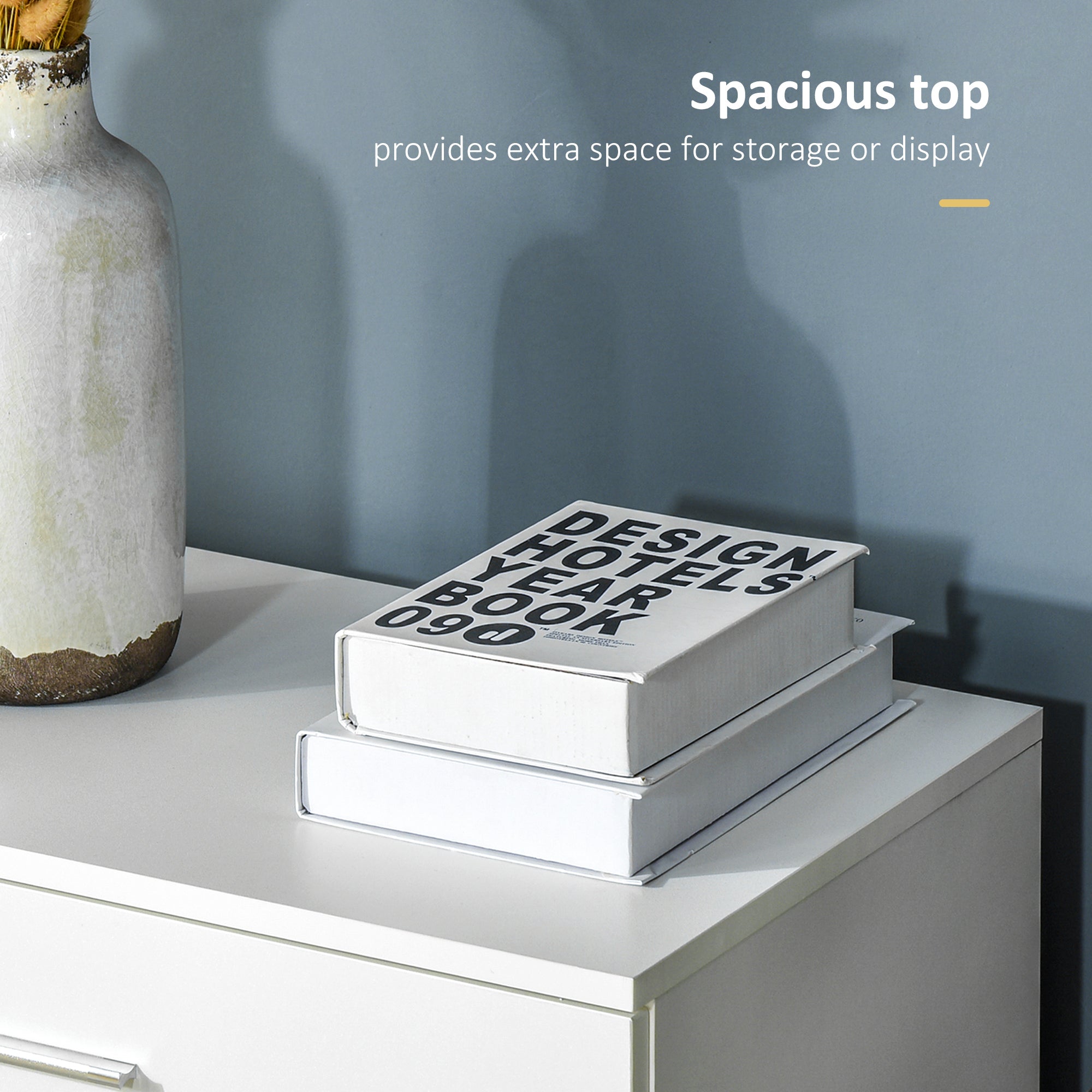 White faux leather design hotels year book stacked on homcom chest of drawers with metal rails and anti-tip features