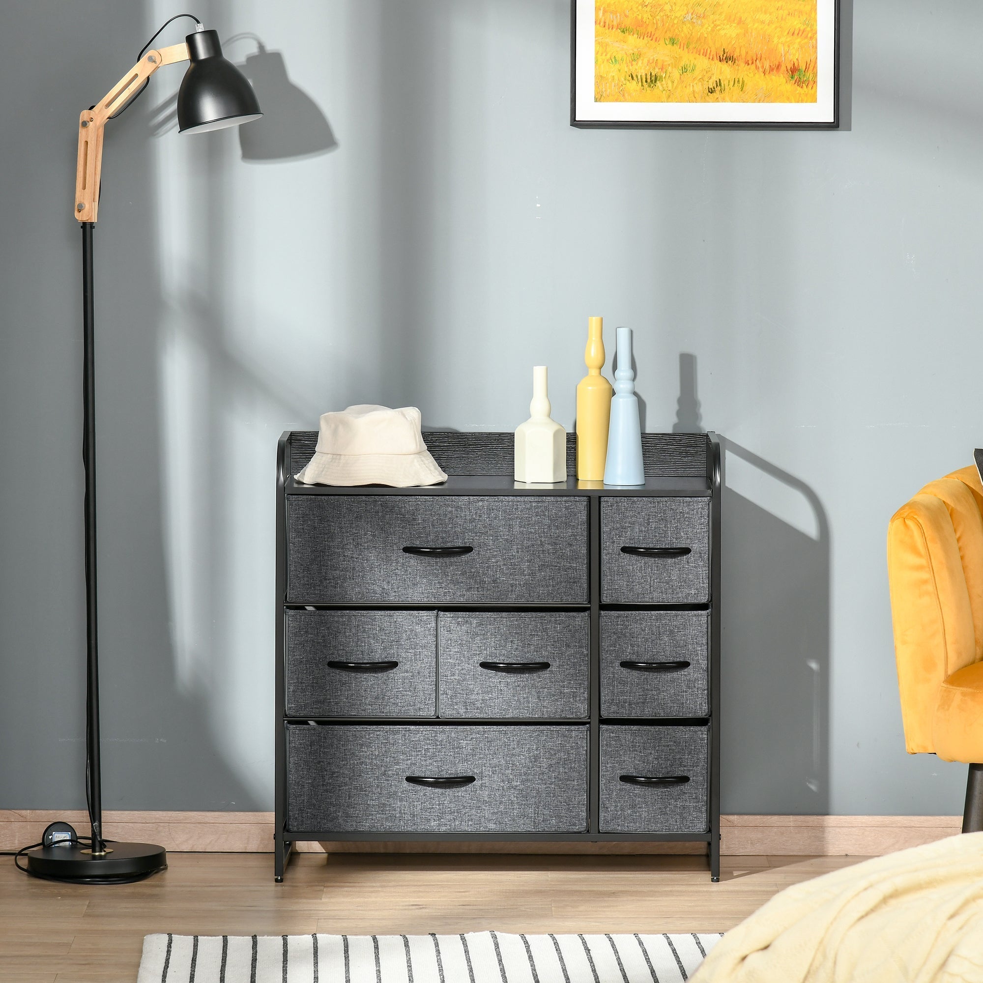 Gray fabric dresser with black metal frame and handles featuring two large, two medium, three small foldable drawers for storage
