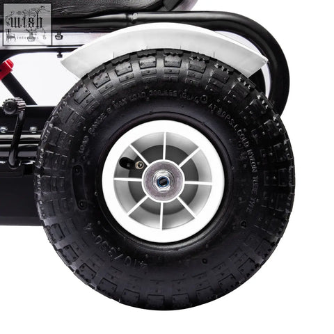 Black inflatable rubber tyre with deep treads on white six-spoke wheel rim for homcom kids pedal go kart with reverse functions