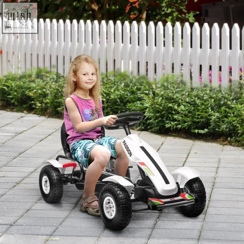 White and black homcom children pedal go kart with red accents featuring inflatable rubber tyres and reverse functions