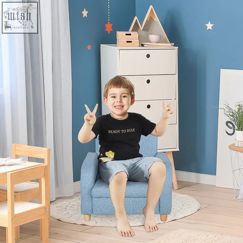 Blue linen upholstered children’s armchair with solid wood frame high armrests and anti-slip legs for playroom use