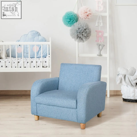 Light blue childrens armchair with linen upholstery solid wood frame and high armrests for bedroom or playroom use