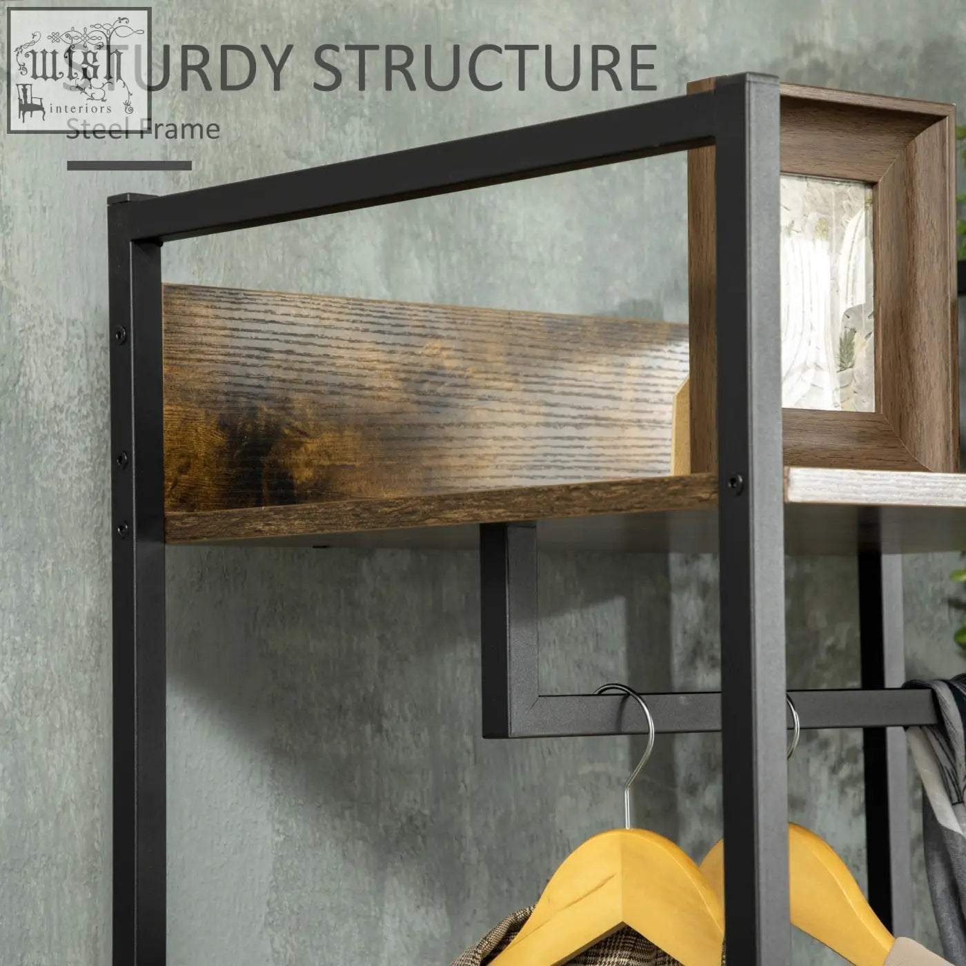 Industrial-style clothes rail with black steel frame and rustic brown wooden shelves for bedroom or hallway use