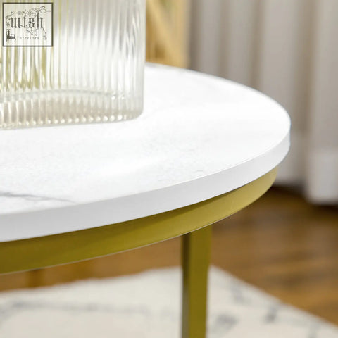 White marble top coffee table with gold metal frame and slender legs perfect for living room table tops