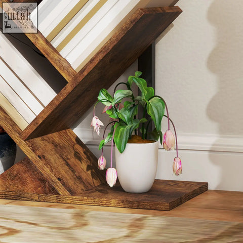 A white ceramic planter with green leaves and pink flowers on a wood effect homcom eight section tree bookcase made of robust particle board
