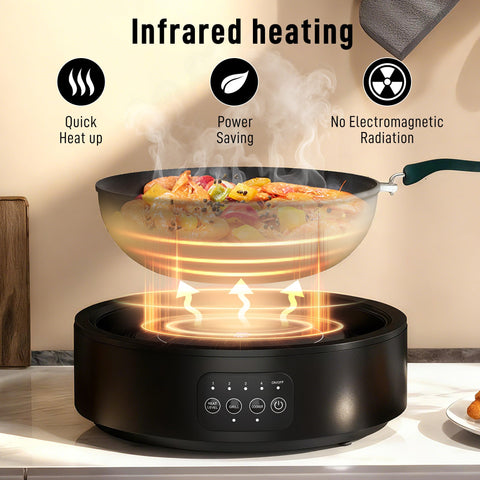 Black ceramic hob with smooth glass surface and grease collector pan featuring heat control buttons and frying pan on top
