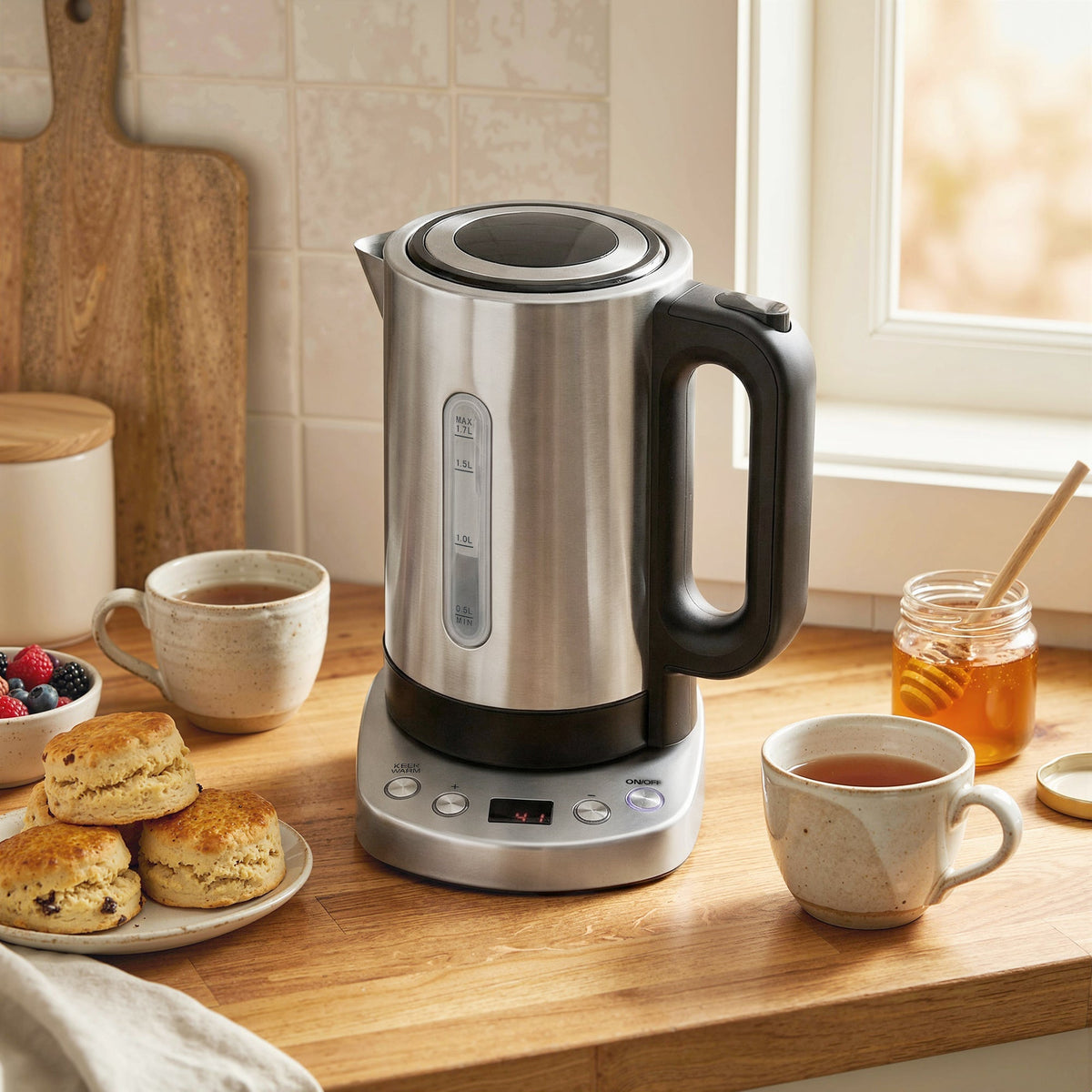 HOMCOM stainless steel electric kettle with black handle, digital display, 1.7L fast boil, and warm function