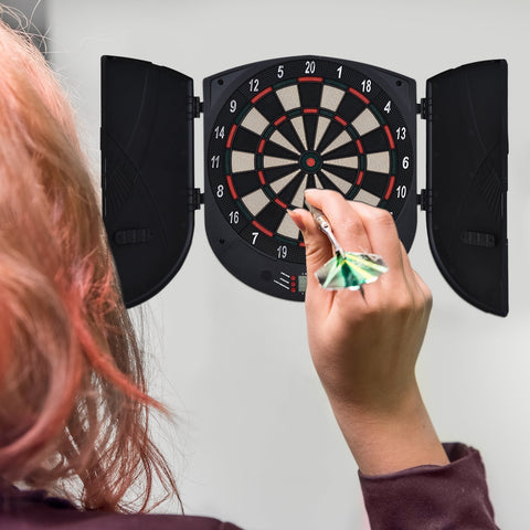 Black electronic dartboard with red and white segments and lcd display includes darts and language tips for multi-game play