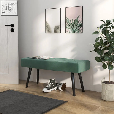 Emerald green upholstered hallway bench with x-shape design and powder coated steel legs for bedroom use
