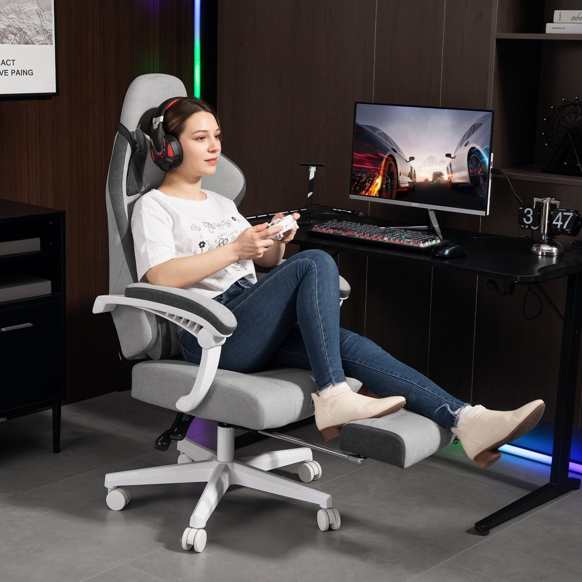 Gray HOMCOM ergonomic gaming chair with printed velvet, lumbar support, footrest, and white wheels for office or gaming