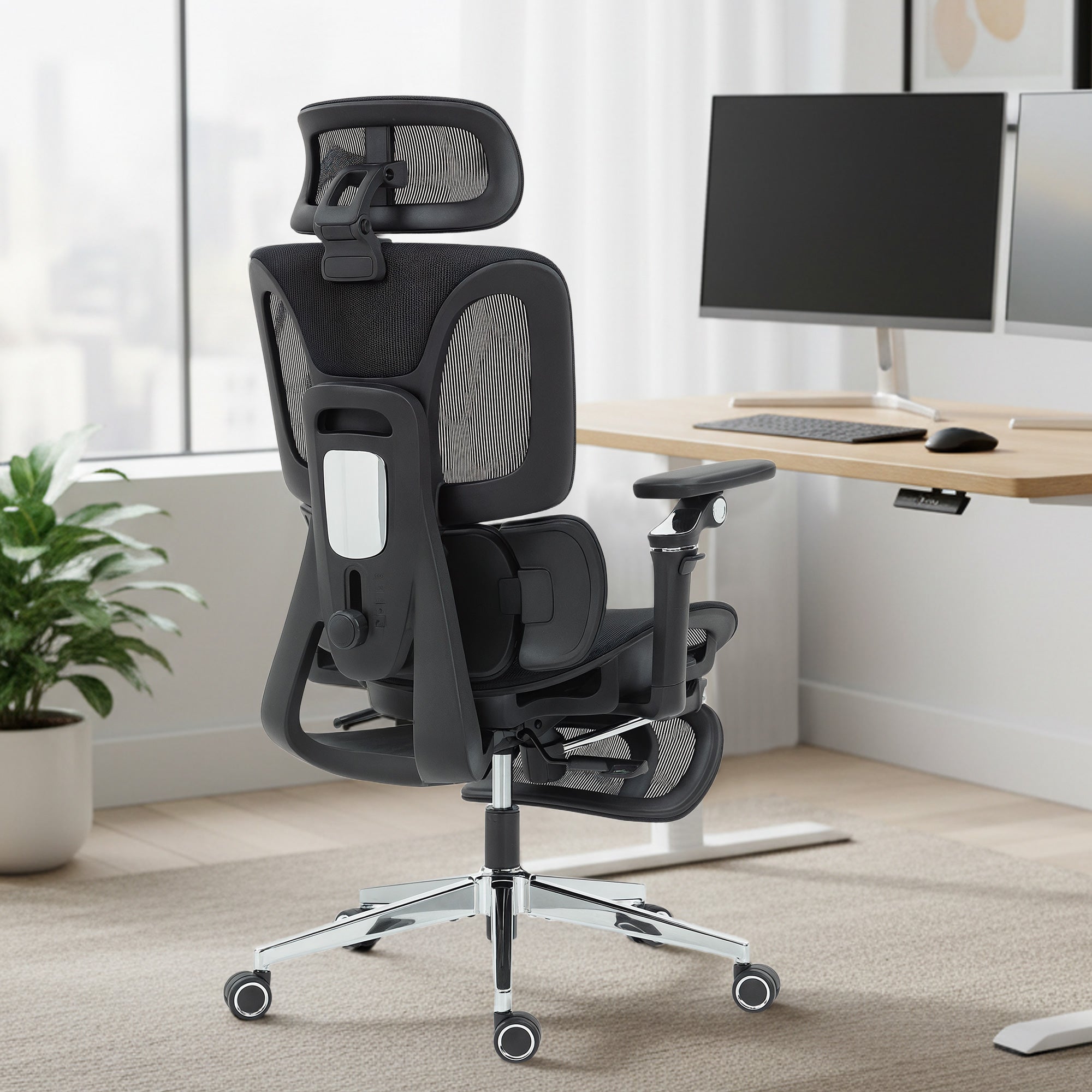 Black HOMCOM ergonomic office chair with mesh back, lumbar support, adjustable armrests, and seat depth for comfort