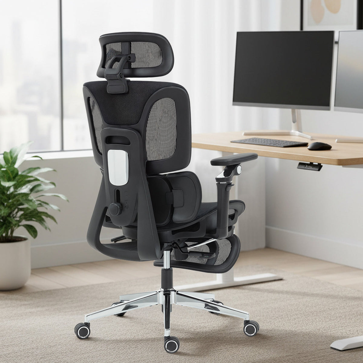 Black HOMCOM ergonomic office chair with mesh back, lumbar support, adjustable armrests, and seat depth for comfort