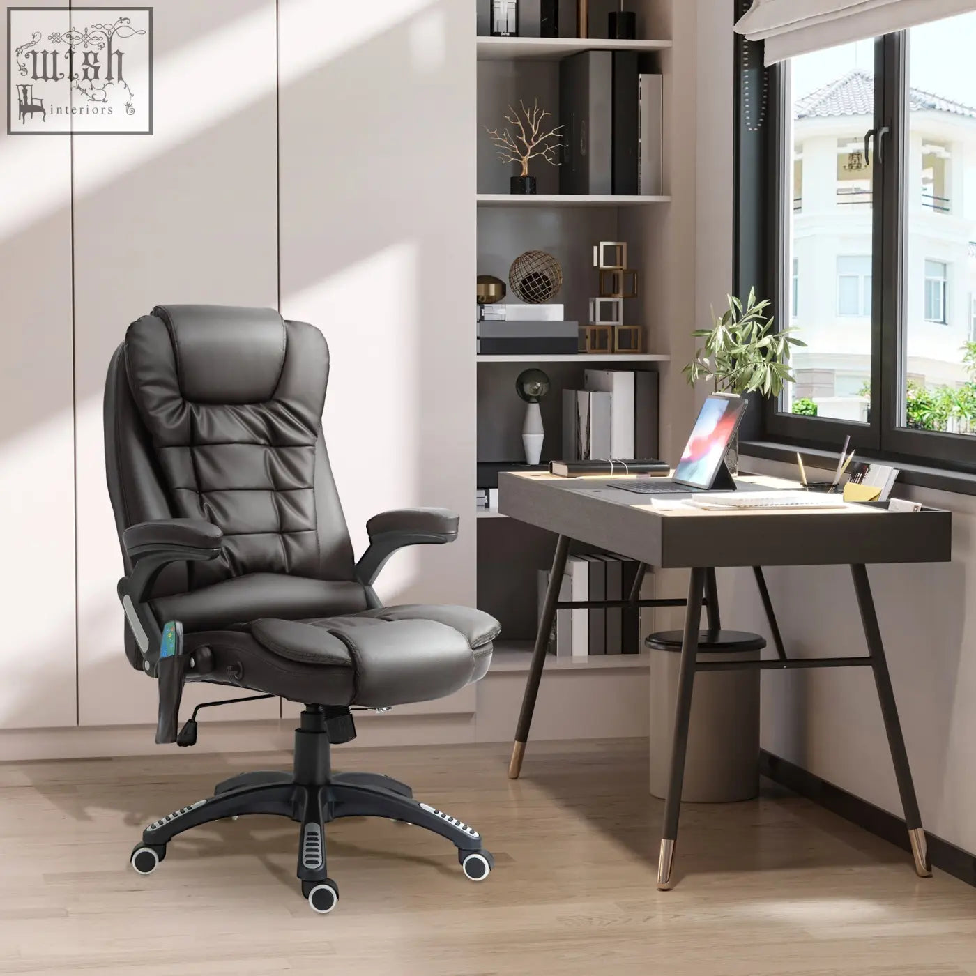 Black leather executive office chair with quilted upholstery and adjustable armrests for massage office chair use