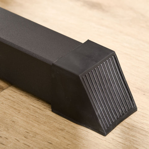 Black rubber door stop with ribbed base for grip on homcom exercise pulley machine with tough core steel frame