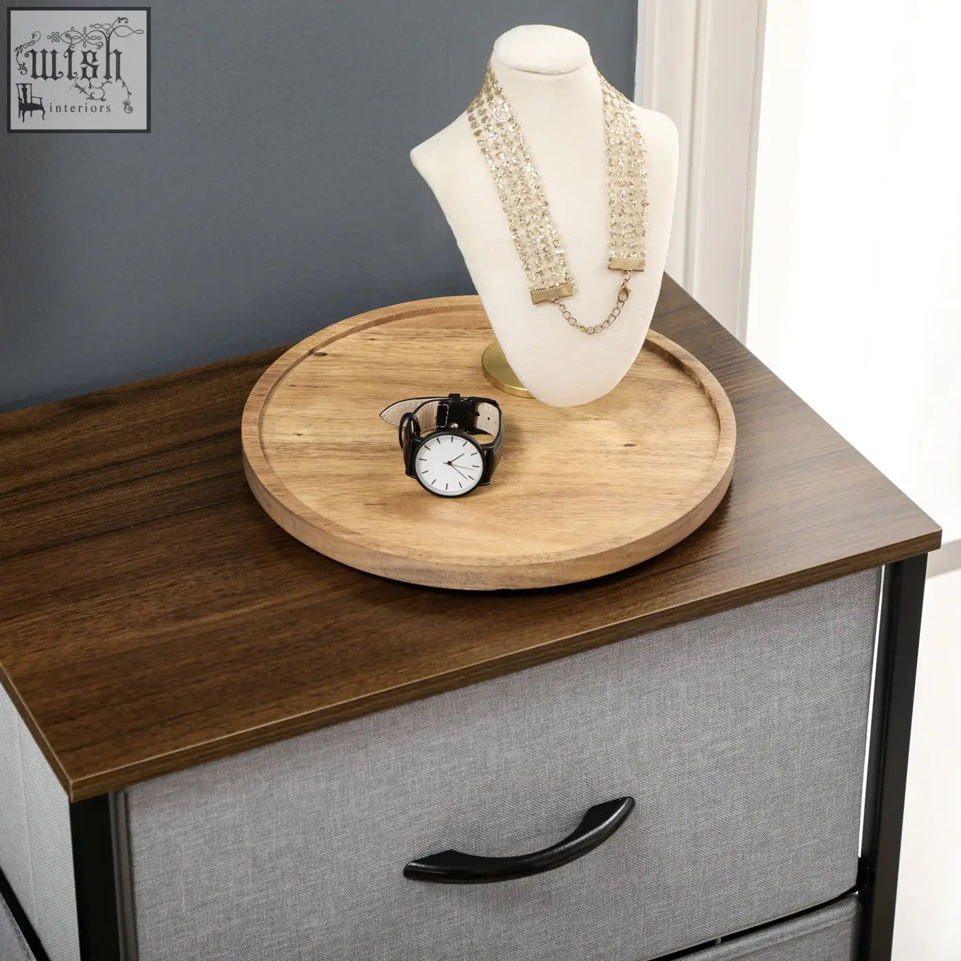 Delicate gold-toned necklace with rhinestones displayed on white bust alongside homcom fabric chest with steel frame and fabric drawers