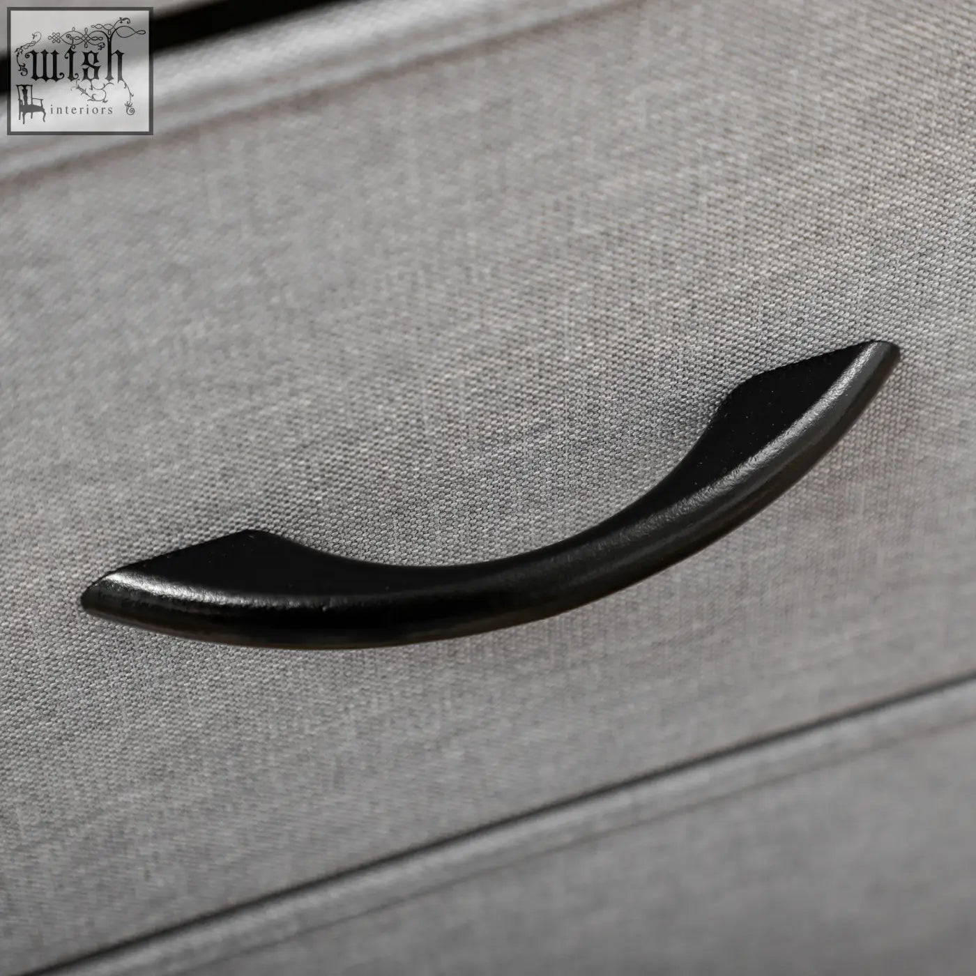 Black curved drawer handle on homcom fabric chest with grey fabric drawers and sturdy steel frame close-up view