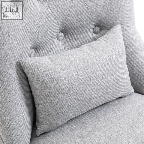 Gray tufted accent chair with matching pillow upholstered fabric and solid wood legs for living room furniture