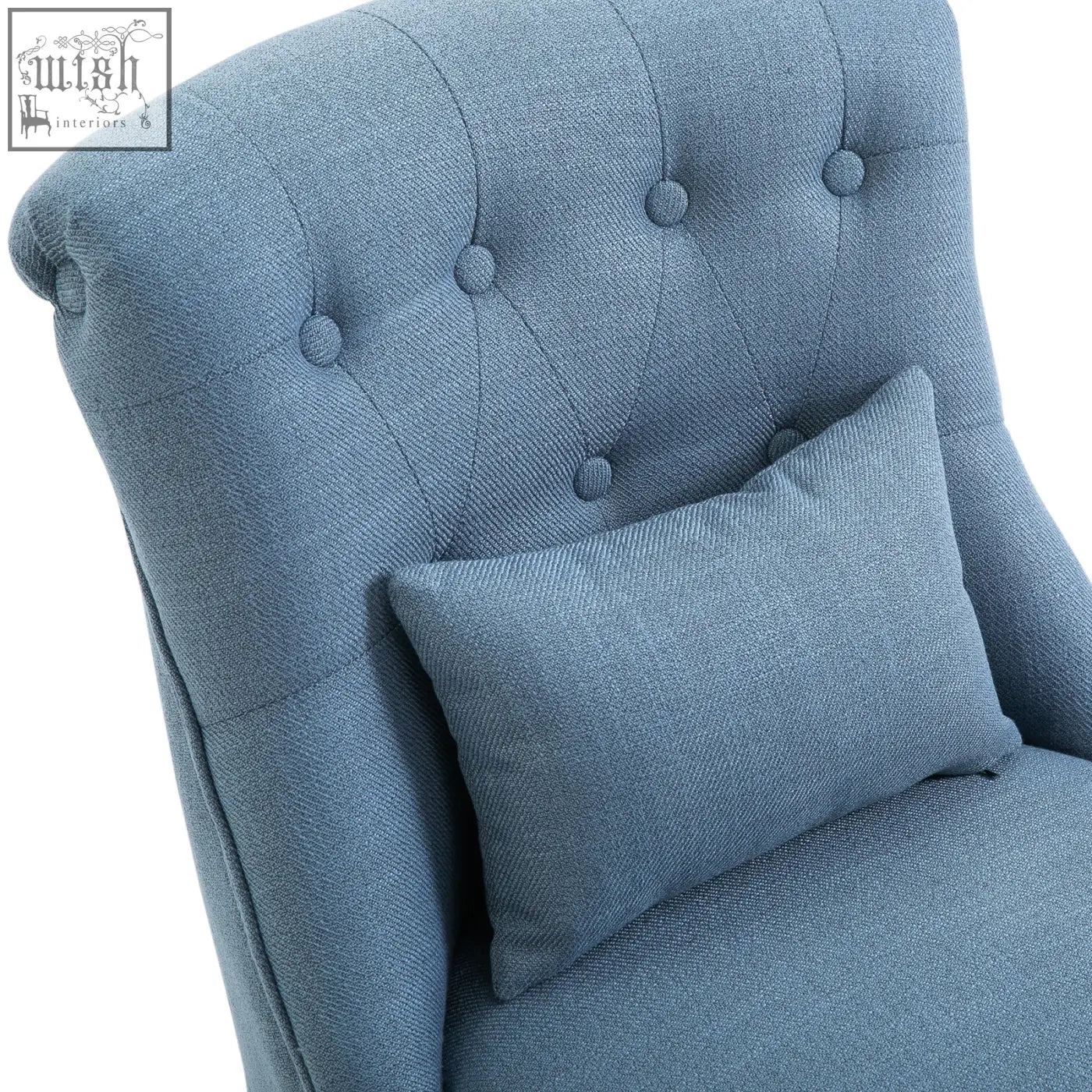 Blue tufted fabric accent chair with button tufting and matching pillow in linen-look fabric for living room use