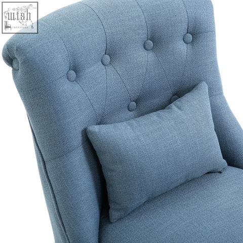 Blue tufted fabric accent chair with button tufting and matching pillow in linen-look fabric for living room use