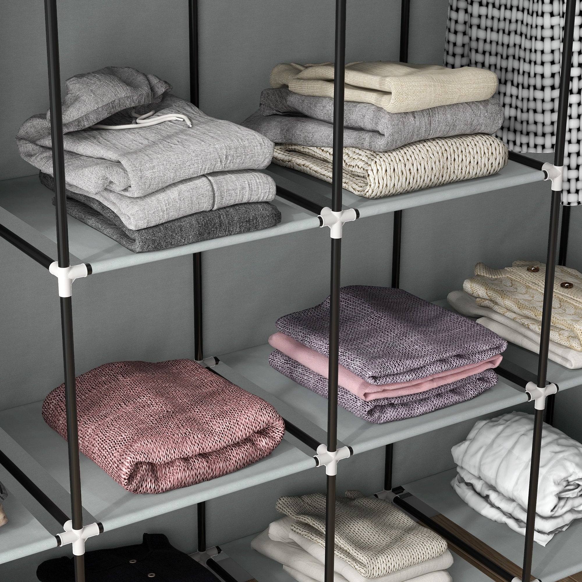 Black metal frame fabric wardrobe with ten compartments gray shelves and fabric drawers holding folded sweaters