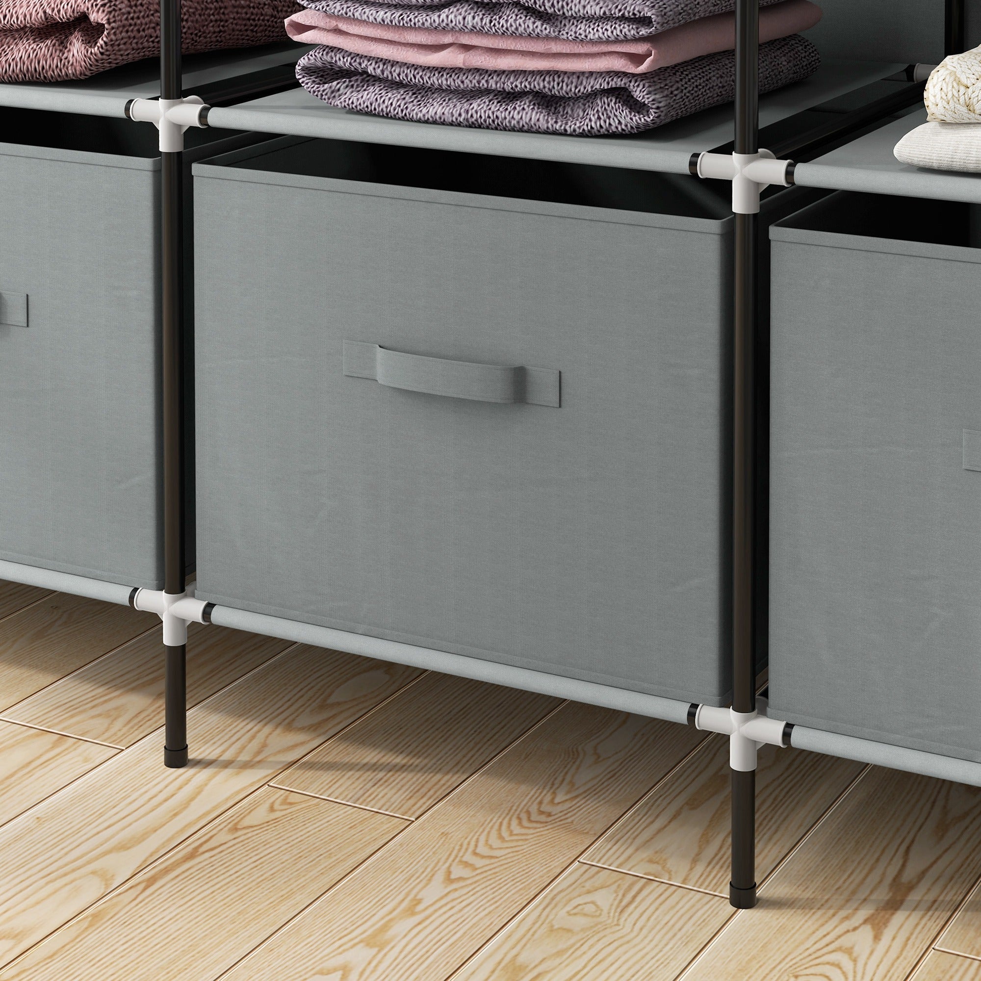 Gray fabric storage bins in homcom fabric wardrobe with ten compartments and fabric drawers in black and white frame