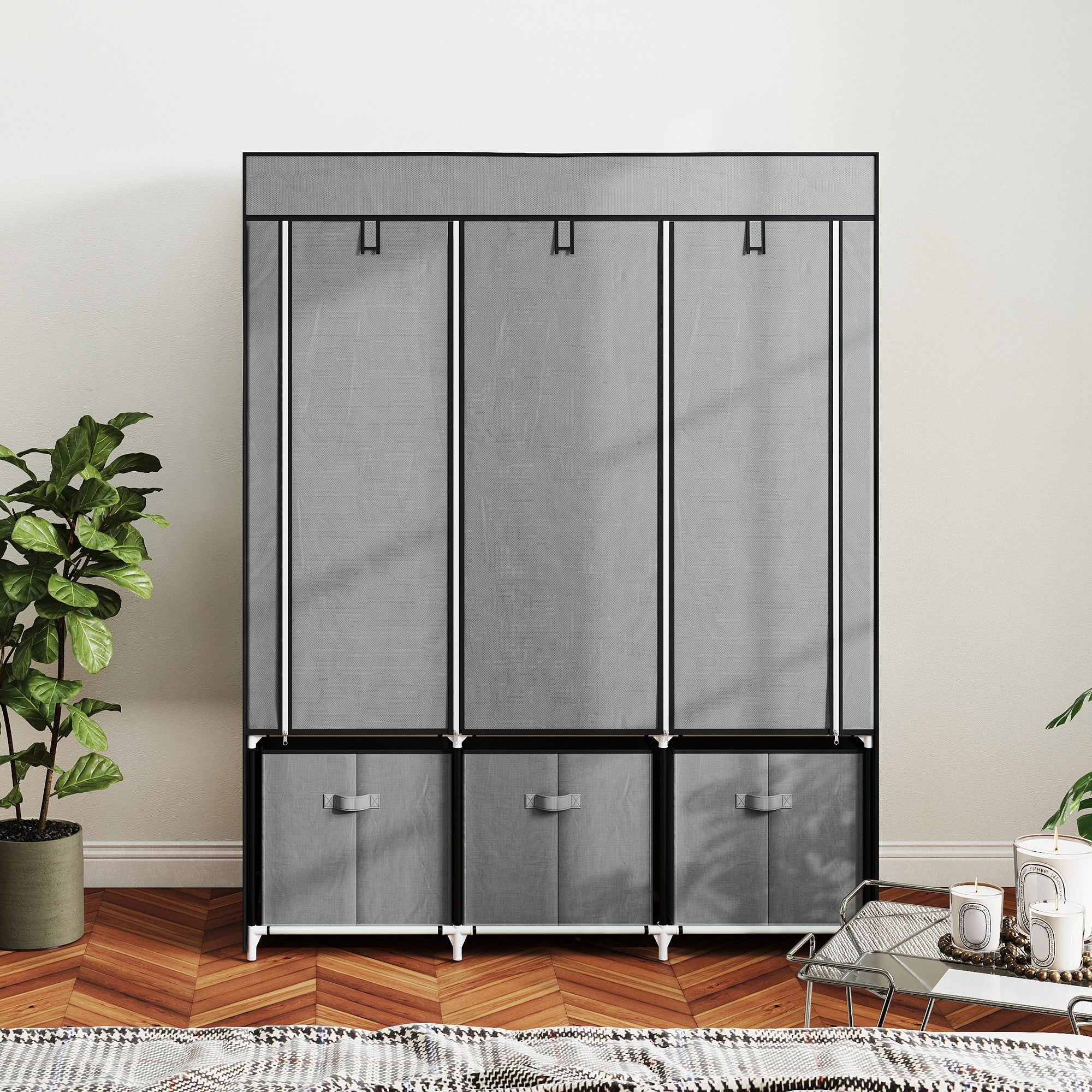 Gray homcom fabric wardrobe with black metal frame, three sliding doors, hanging rod, and gray storage bins at base