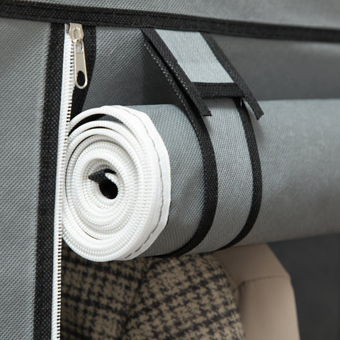 A neatly rolled white yoga mat with black straps inside a gray fabric storage bag for clothes storage in homcom wardrobe with hanging rod and non-woven fabric cover