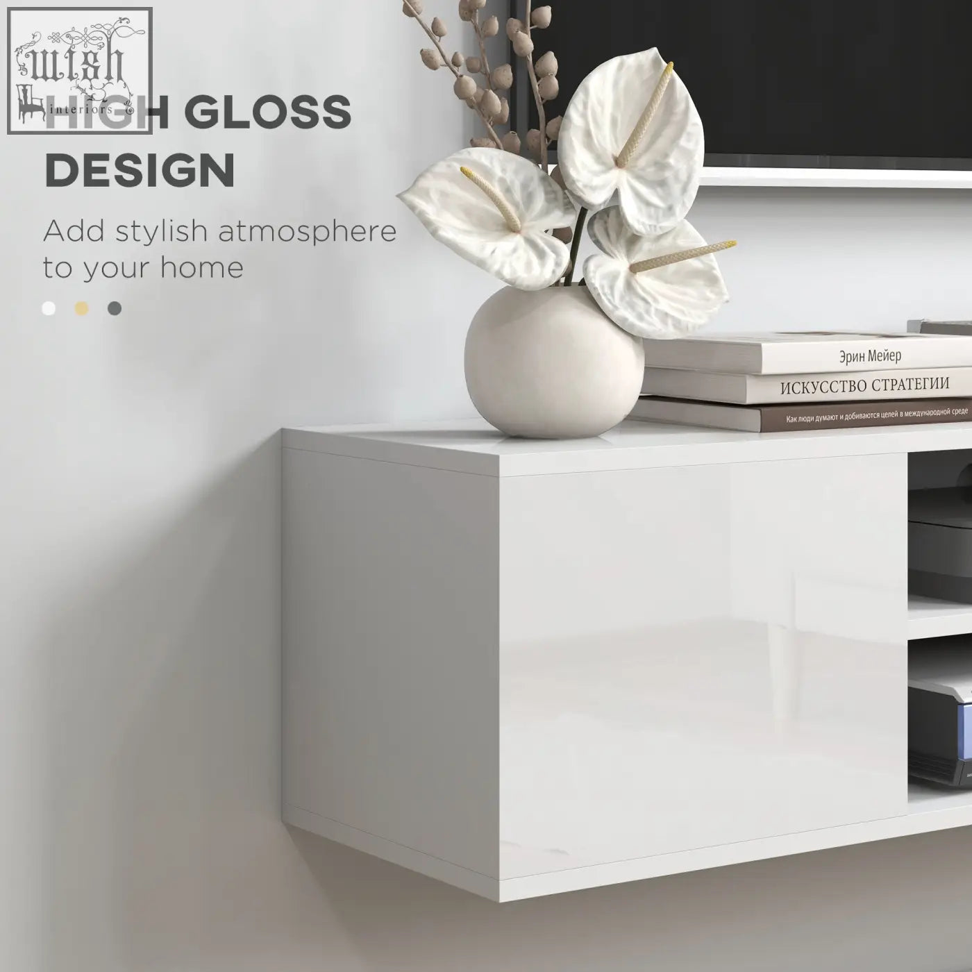 White high-gloss ceramic vase with white anthurium flowers on homcom floating tv stand cabinet with open shelves and storage space
