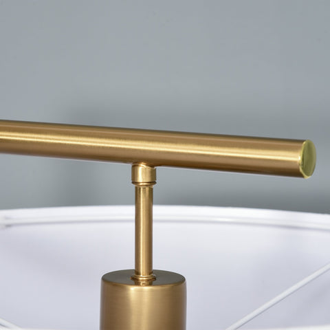 Gold-toned floor lamp with linen lampshade and cylindrical base perfect for living room or bedroom lighting