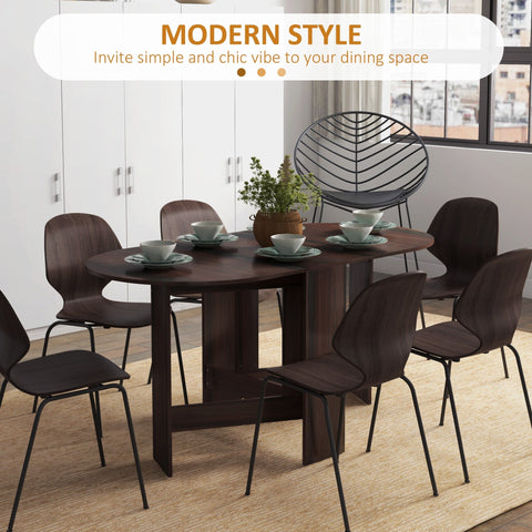 Dark wood oval folding dining table with drop leaf design and sleek black metal legs for small spaces 80d x 75h