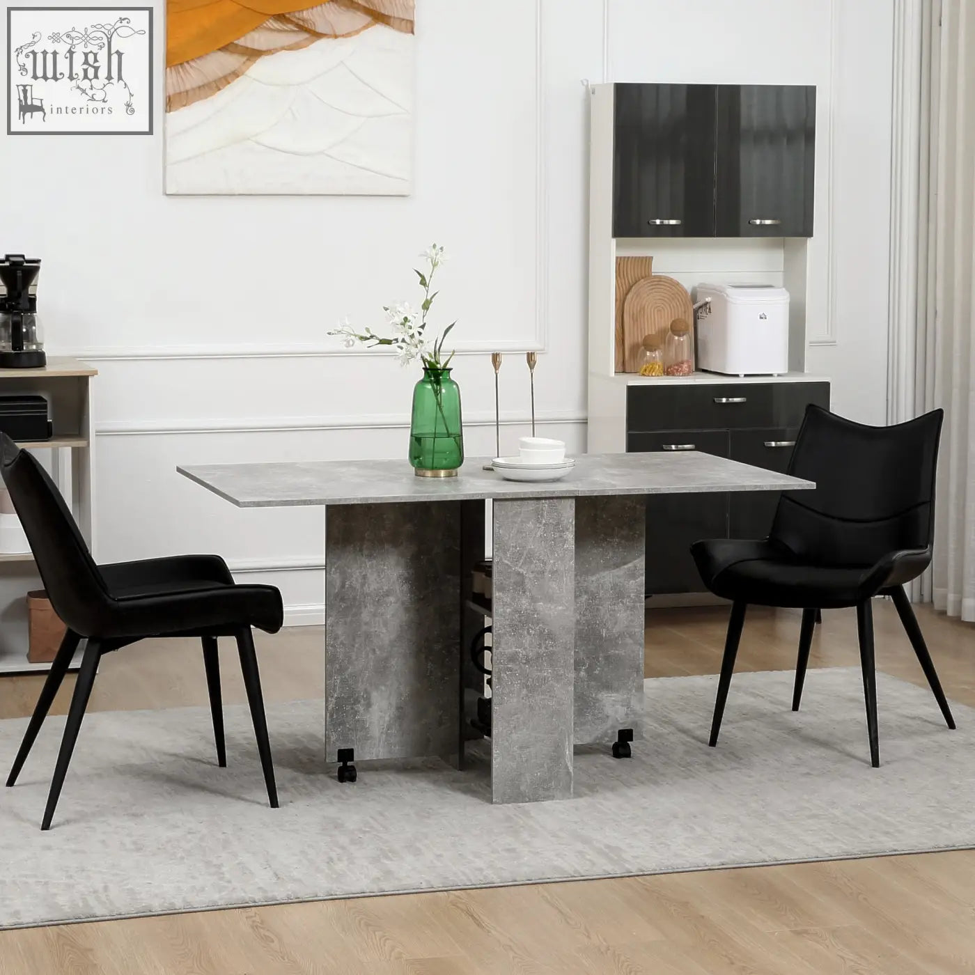 Gray concrete textured folding dining table with drop leaf, black metal legs, caster wheels for small spaces
