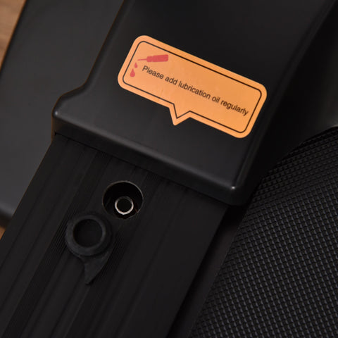 Black plastic homcom folding treadmill with led screen, two wheels, and an orange sticker about lubrication oil