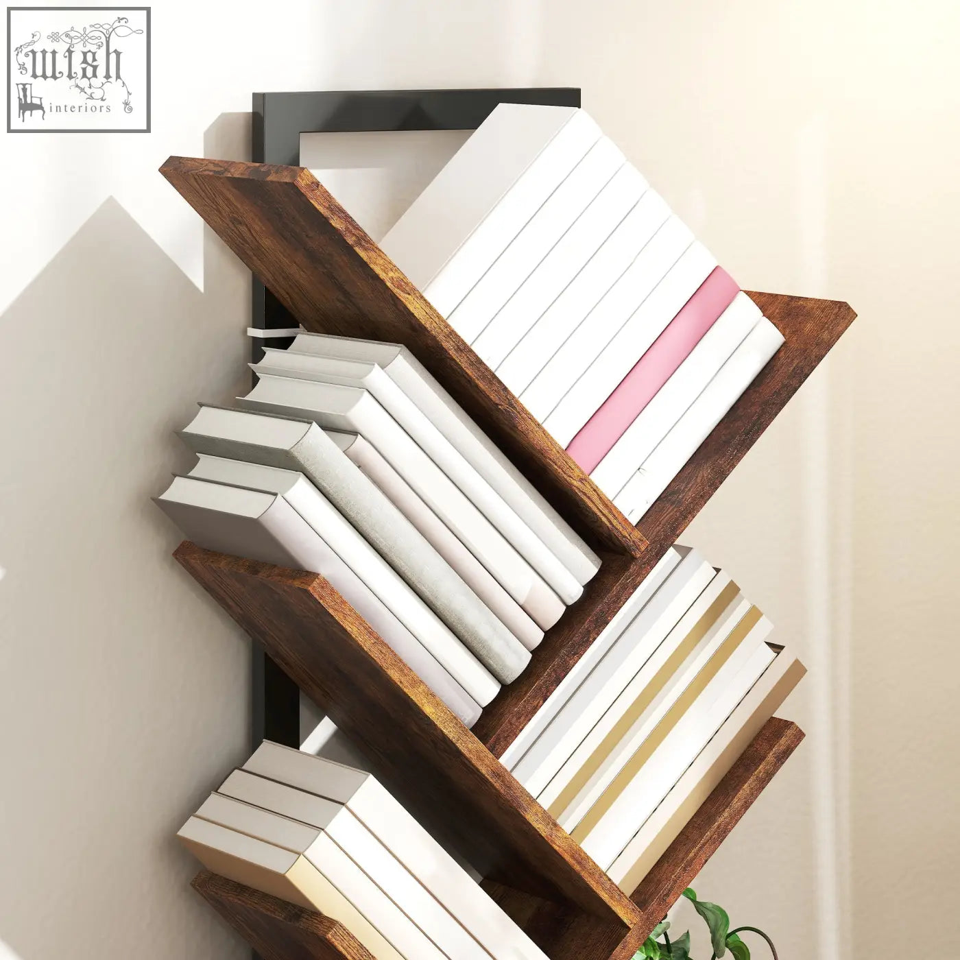 Dark brown wooden homcom four-section tree bookcase with angled shelves made of robust particle board holding white books and one pink spine