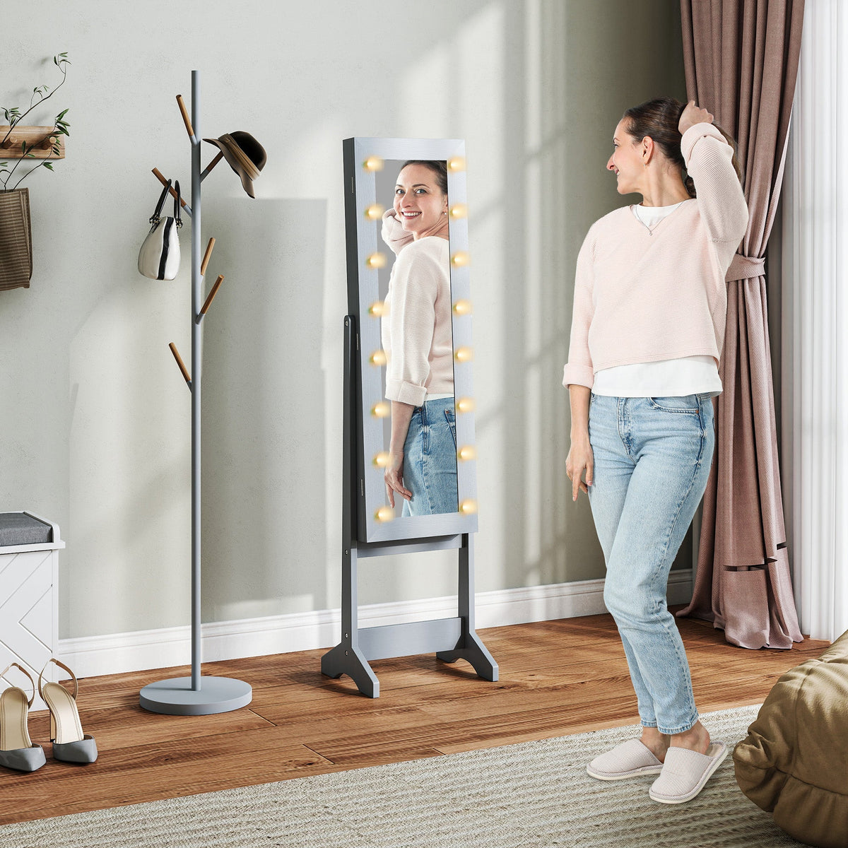 Gray free standing mirror cabinet with led lights and adjustable angles for jewelry and makeup storage
