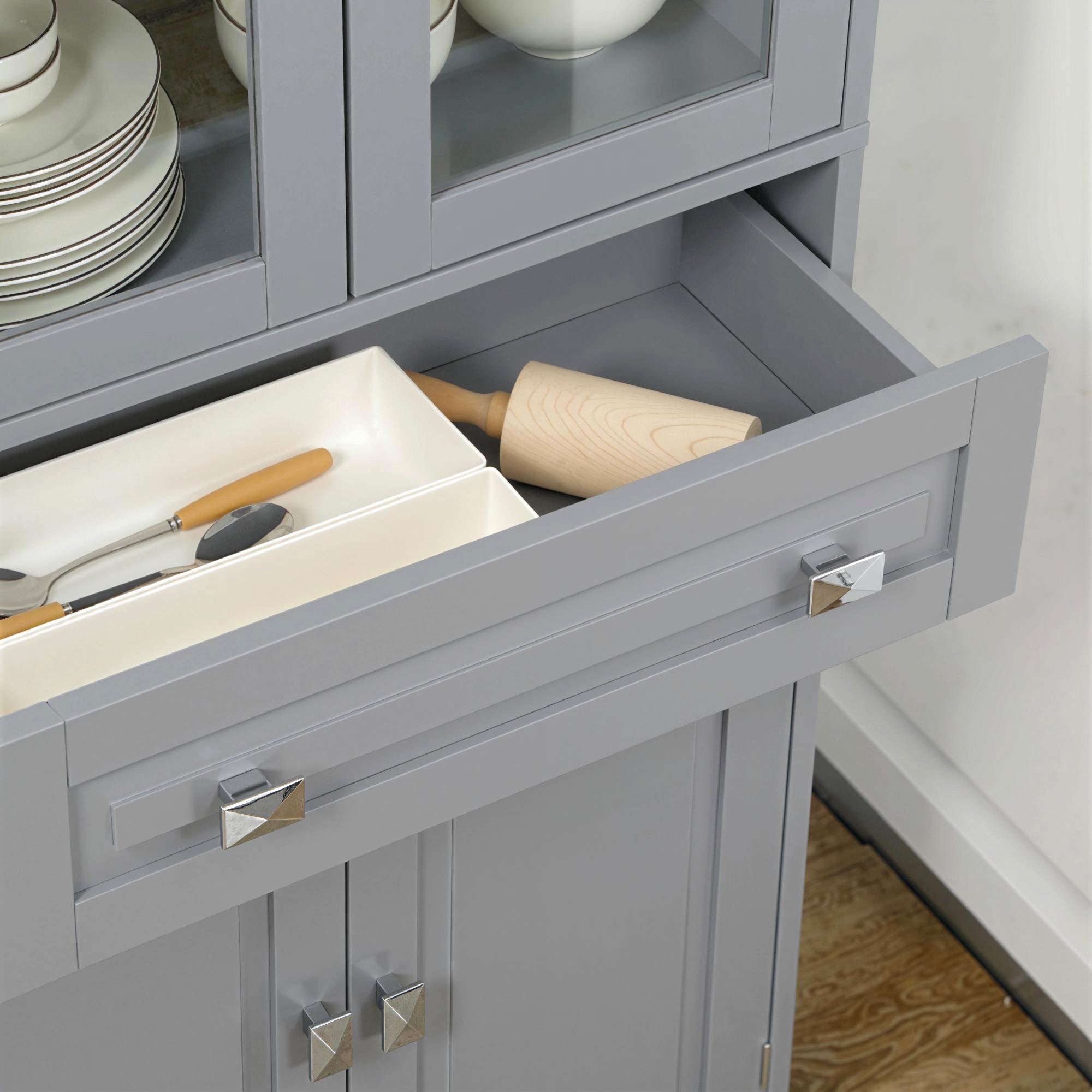 Light gray homcom freestanding kitchen cupboard with glass door, drawer, and adjustable shelves for storage use