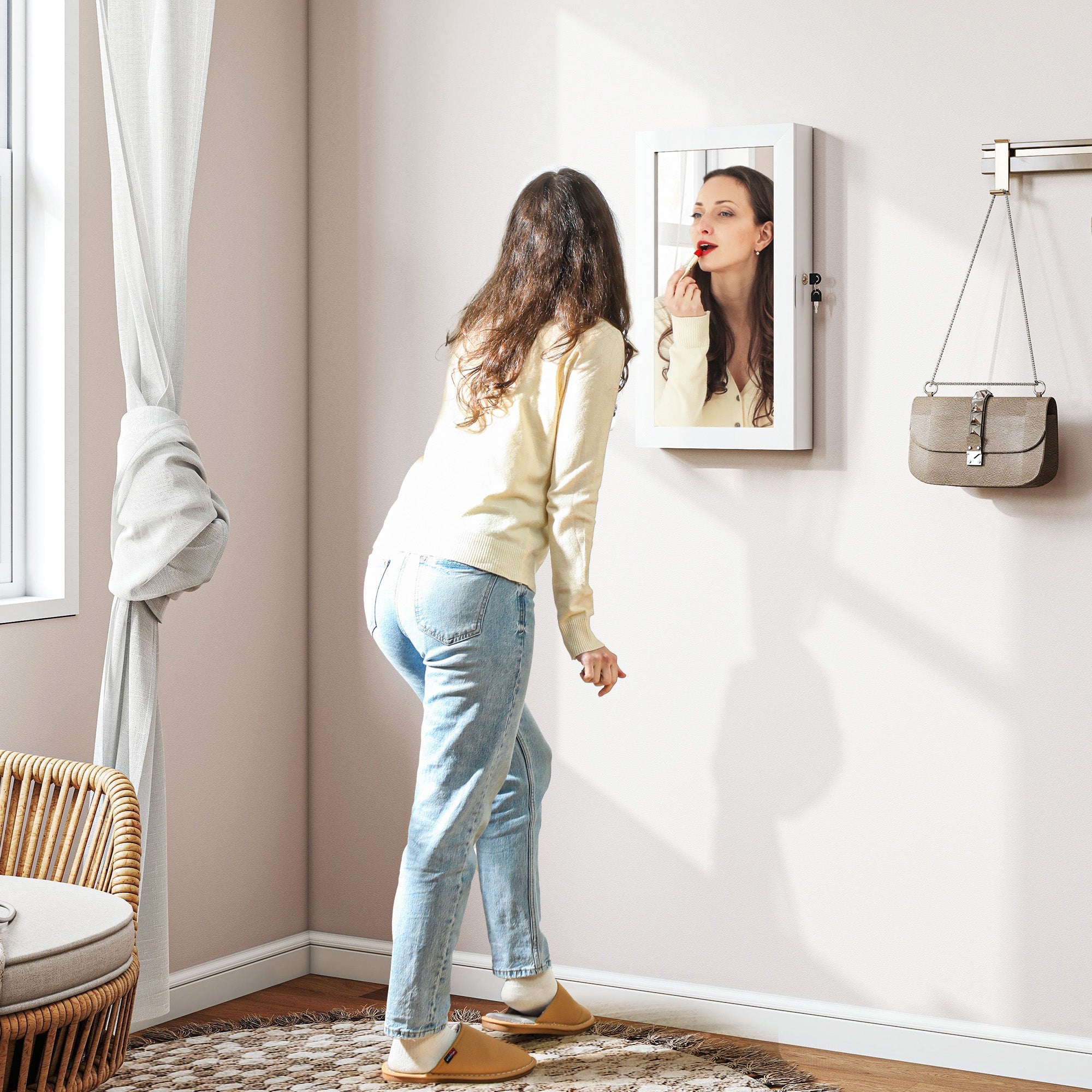 White framed wall-mounted homcom jewelry cabinet with mirror, built-in jewelry box, and secure lock for storage