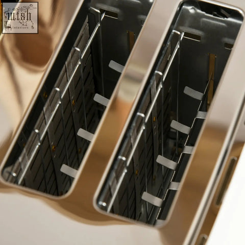 Stainless steel two-slice toaster with sleek reflective finish and wire racks part of HOMCOM rapid boil kettle and toaster set cream white