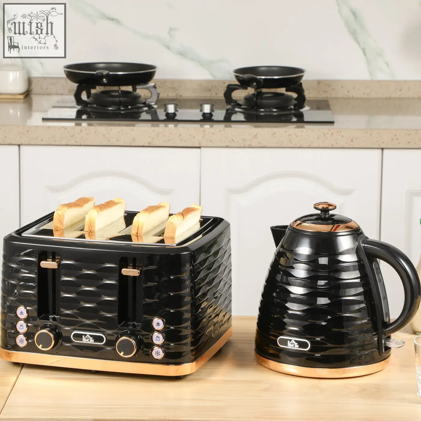 Black and copper textured 4 slice toaster and matching rapid boil kettle set on wooden countertop by HOMCOM