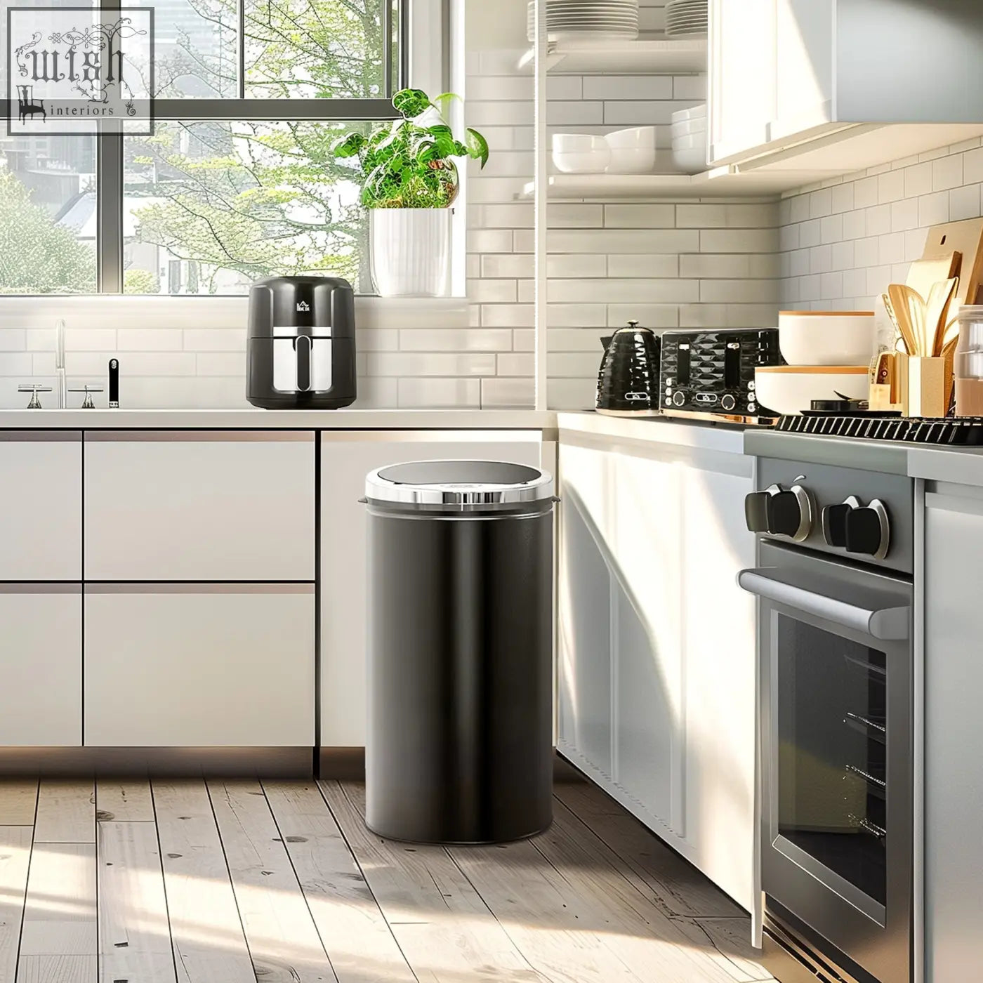 Black cylindrical trash can with silver lid next to HOMCOM black rapid boil kettle and 4 slice toaster set