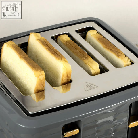 Gray HOMCOM rapid boil kettle and toaster set with gold accents toasting four bread slices in brushed steel interior