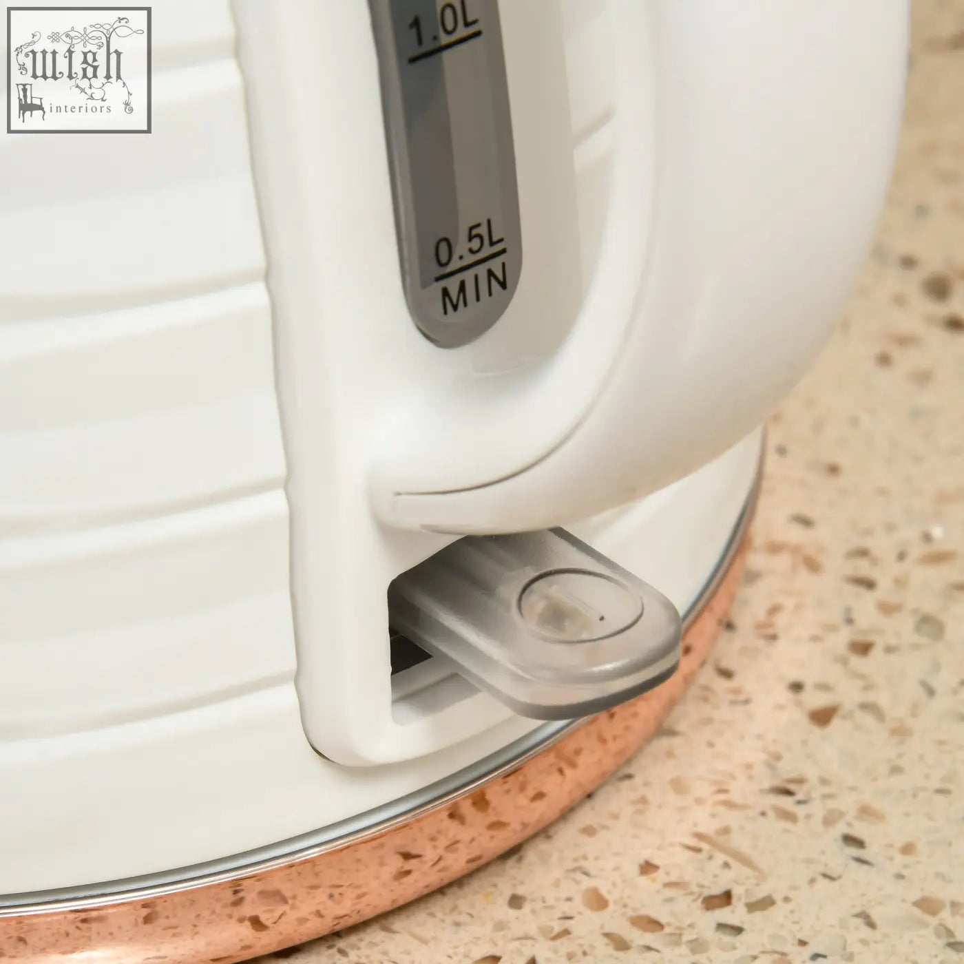 Cream white homcom rapid boil kettle with copper base, gray spout cover, 1.7l capacity, and vertical measurement markings