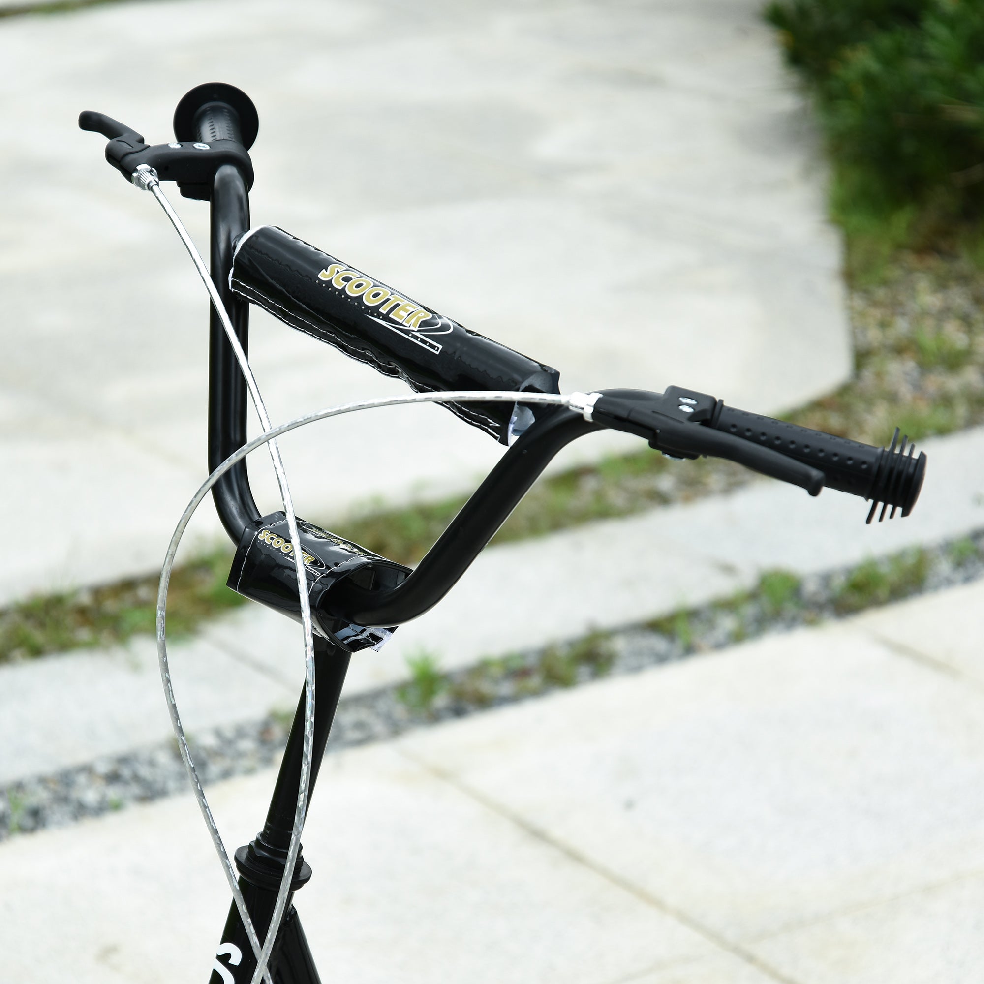 Black homcom kick scooter handlebar with textured grips and silver cables featuring rubber wheels for kids aged 5+