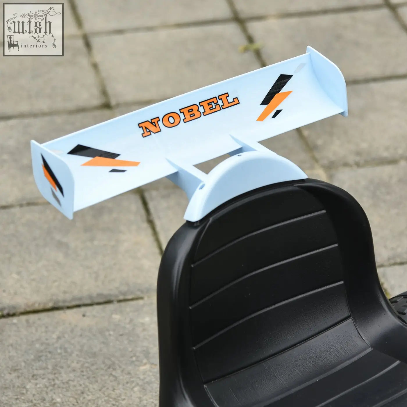 White plastic racing spoiler with nobel branding and orange black lightning decals on homcom kids pedal go kart with steering wheel plastic wheels and high-quality metal frame