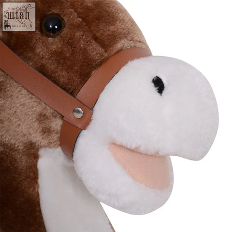 Brown and white plush rocking horse with wooden base and handle grip perfect for kids age 3 plus ride on toy