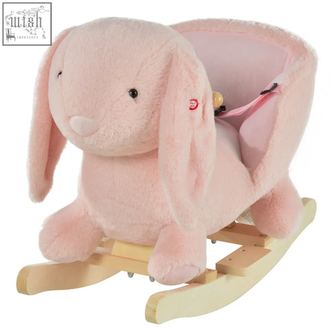 Pink plush rocking horse with wooden wood base, sound button, and soft seat for toddlers 18 to 36 months