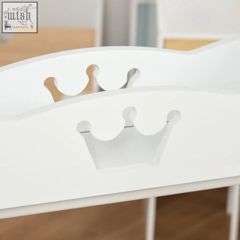 White wooden tray with crown-shaped cutouts on homcom kids clothes rail for kids clothes storage and hanging